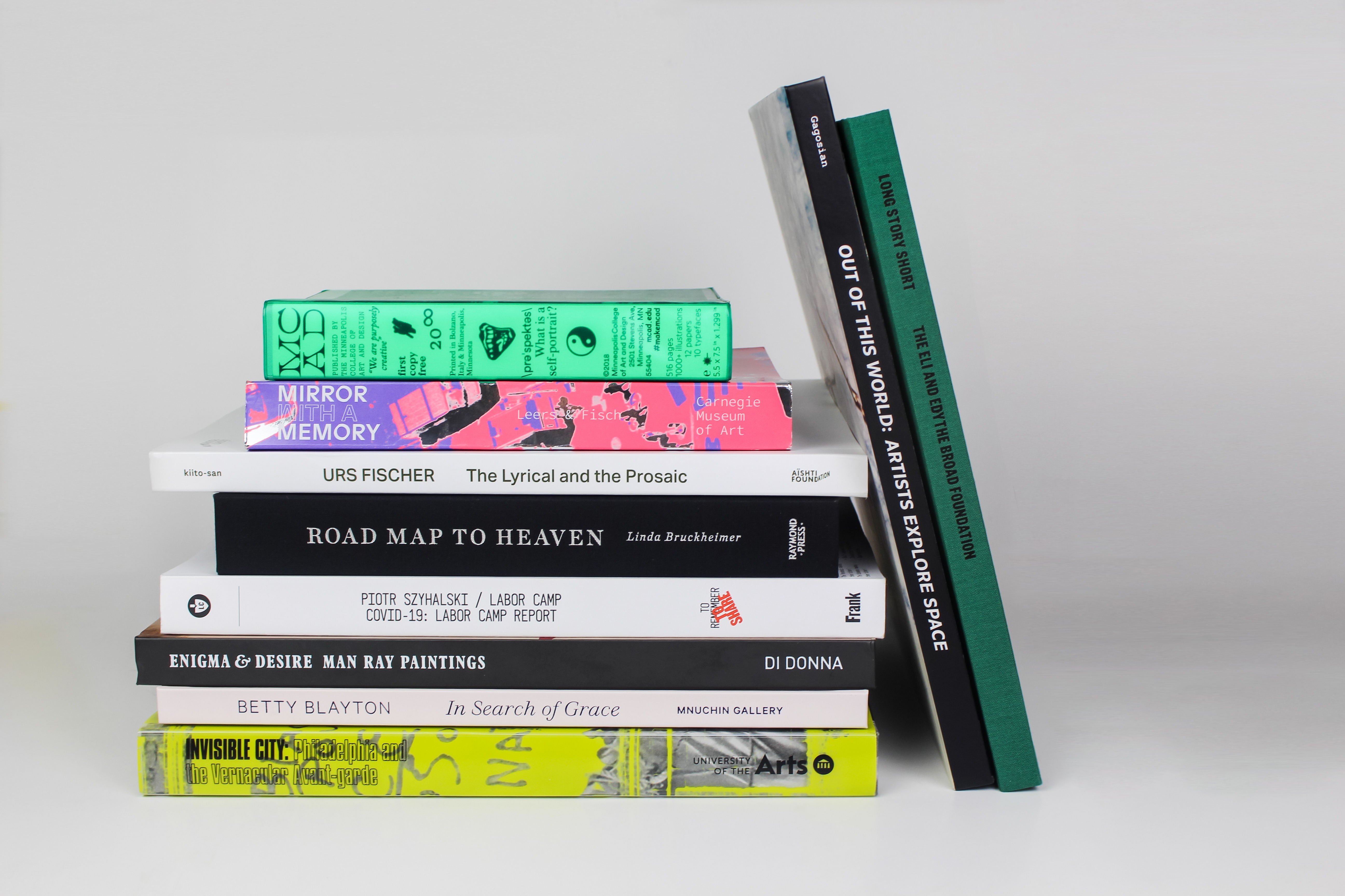 stack of fine art books printed by Point B